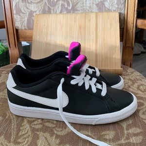 Woman’s Nikes, never worn